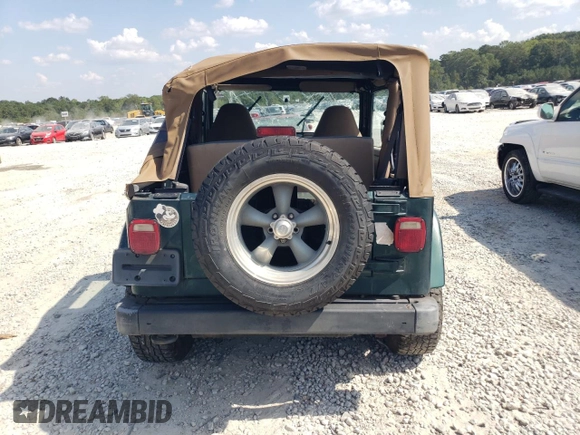 2001 Jeep Wrangler Sahara with VIN 1J4FA59S71P339334, listed as a Copart auction lot 74805224 with 265,778 mi miles and Salvage Title. Bid and sale history available at carsss.com. Image 6.