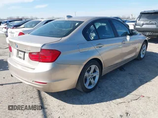 2014 BMW 3 Series 328i xDrive with VIN WBA3B5G50ENS10711, listed as a IAAI auction lot 41595781 with 161,568 mi miles. Bid and sale history available at carsss.com. Image 4.