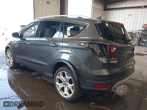 2019 Ford Escape Titanium with VIN 1FMCU9J97KUC55772, listed as a IAAI auction lot 42514001 with 77,737 mi miles and . Bid and sale history available at DreamBid. Image 3.