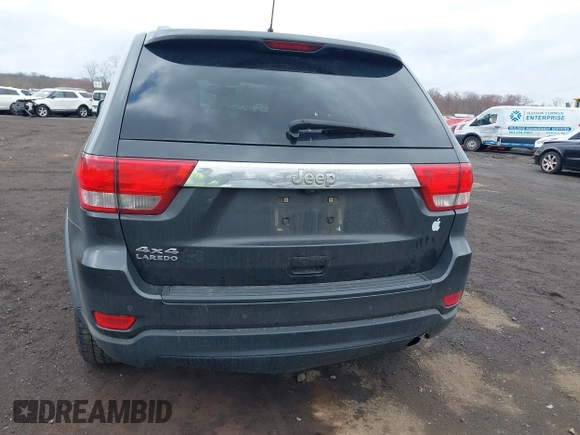 2011 Jeep Grand Cherokee Laredo with VIN 1J4RR4GGXBC597743, listed as a IAAI auction lot 41897286 with 253,111 mi miles and . Bid and sale history available at DreamBid. Image 16.
