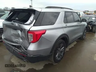 2022 Ford Explorer XLT z VIN 1FMSK8DH7NGB83988, wystawiony jako IAAI lot #41351547 z przebiegiem 60 668 mil mil oraz . Historia ofert i sprzedaży dostępna na DreamBid. Obrazek 4.