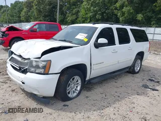2014 Chevrolet Suburban LT with VIN 1GNSCJE08ER185472, listed as a IAAI auction lot 39849223 with 198,853 mi miles. Bid and sale history available at carsss.com. Image 17.