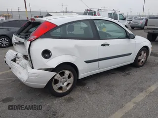 2003 Ford Focus ZX3 with VIN 3FAFP31Z23R147547, listed as a IAAI auction lot 42426117 with 129,860 mi miles and . Bid and sale history available at DreamBid. Image 4.