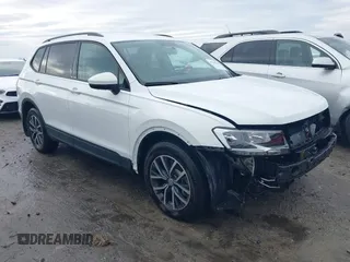 2021 Volkswagen Tiguan S with VIN 3VV1B7AX5MM045667, listed as a IAAI auction lot 41256945 with 90,523 mi miles and . Bid and sale history available at DreamBid. Image 1.