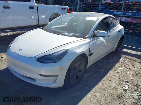 2023 Tesla Model 3 z VIN 5YJ3E1EA4PF482005, wystawiony jako IAAI lot #41363157 z przebiegiem 26 013 mil mil oraz . Historia ofert i sprzedaży dostępna na DreamBid. Obrazek 2.