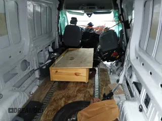 2018 Ford Transit with VIN 1FTYR2XM2JKB03150, listed as a IAAI auction lot 34595758 with 219,946 mi miles and . Bid and sale history available at DreamBid. Image 8.