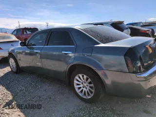 2005 Chrysler 300 with VIN 2C3AA63H35H659798, listed as a Copart auction lot 50322065 with 153,944 mi miles and Salvage Title. Bid and sale history available at carsss.com. Image 2.