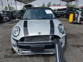 2021 MINI Hardtop Cooper with VIN WMWXR3C09M2N96671, listed as a IAAI auction lot 42031023 with 12,450 mi miles and . Bid and sale history available at DreamBid. Image 12.