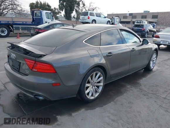 2012 Audi A7 Premium Plus with VIN WAUYGAFC3CN130168, listed as a IAAI auction lot 41647698 with 118,295 mi miles and . Bid and sale history available at DreamBid. Image 4.