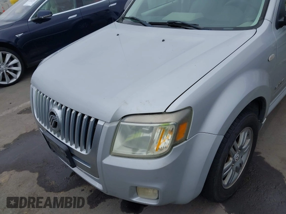 2008 Mercury Mariner with VIN 4M2CU81148KJ26119, listed as a IAAI auction lot 42189605 with 144,816 mi miles and . Bid and sale history available at DreamBid. Image 6.
