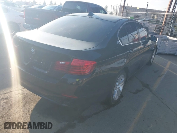 2013 BMW 5 Series 528i with VIN WBAXG5C5XDDY30558, listed as a IAAI auction lot 41636788 with 104,070 mi miles and . Bid and sale history available at carsss.com. Image 4.