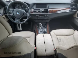 2012 BMW X5 35i z VIN 5UXZV4C5XCL748652, wystawiony jako Copart lot #55457455 z przebiegiem 149 030 mil mil oraz Szkoda całkowita • Salvage title. Historia ofert i sprzedaży dostępna na DreamBid. Obrazek 8.