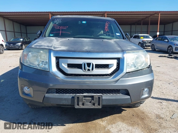 2011 Honda Pilot EX-L with VIN 5FNYF3H64BB056071, listed as a IAAI auction lot 41841047 with 112,114 mi miles and . Bid and sale history available at carsss.com. Image 12.