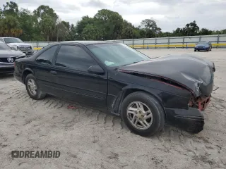 1997 Ford Thunderbird LX z VIN 1FALP62W7VH165149, wystawiony jako Copart lot #56654715 z przebiegiem 155 190 mil mil oraz Szkody całkowita. Historia ofert i sprzedaży dostępna na DreamBid. Obrazek 4.