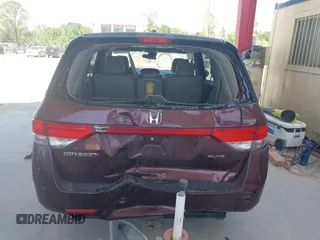 2014 Honda Odyssey Touring with VIN 5FNRL5H90EB080889, listed as a IAAI auction lot 42085305 with 123,286 mi miles and . Bid and sale history available at carsss.com. Image 16.