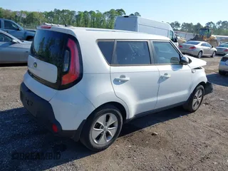 2014 Kia Soul with VIN KNDJN2A29E7058611, listed as a IAAI auction lot 41997441 with 126,757 mi miles. Bid and sale history available at carsss.com. Image 4.