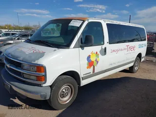 2001 Chevrolet Express with VIN 1GAHG39R211180863, listed as a IAAI auction lot 41855235 with 148,672 mi miles. Bid and sale history available at carsss.com. Image 2.