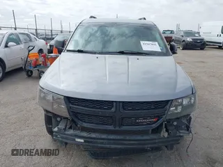 2019 Dodge Journey SE z VIN 3C4PDCBB5KT861358, wystawiony jako IAAI lot #41947841 z przebiegiem 82 099 mil mil oraz . Historia ofert i sprzedaży dostępna na DreamBid. Obrazek 12.