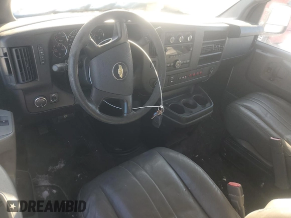 2014 Chevrolet Express Cargo Van with VIN 1GCWGFCB2E1114900, listed as a Copart auction lot 46157065 with 143,434 mi miles and Clean Title. Bid and sale history available at carsss.com. Image 8.