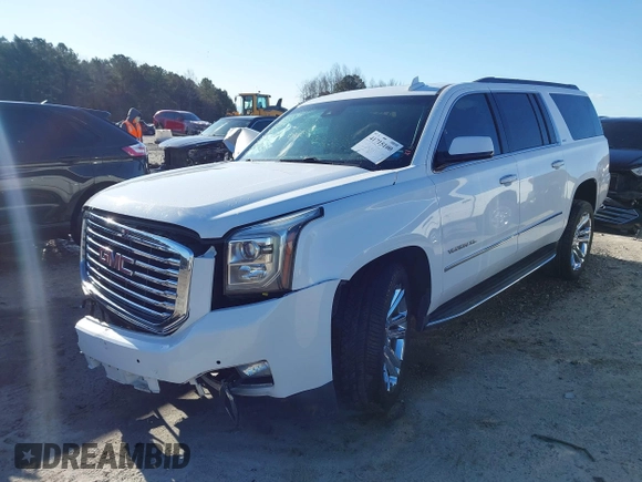 2017 GMC Yukon XL SLT z VIN 1GKS2GKC0HR207440, wystawiony jako IAAI lot #41715100 z przebiegiem 139 529 mil mil oraz . Historia ofert i sprzedaży dostępna na DreamBid. Obrazek 2.