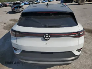 2021 Volkswagen ID.4 Pro S z VIN WVGKMPE22MP046499, wystawiony jako Copart lot #57947235 z przebiegiem 26 759 mil mil oraz Nie do naprawy • Non repairable. Historia ofert i sprzedaży dostępna na DreamBid. Obrazek 6.