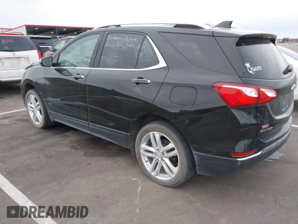 2021 Chevrolet Equinox Premier z VIN 2GNAXXEV4M6118442, wystawiony jako IAAI lot #41392148 z przebiegiem 92 170 mil mil oraz . Historia ofert i sprzedaży dostępna na DreamBid. Obrazek 3.