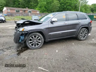2017 Jeep Grand Cherokee Overland с VIN 1C4RJFCG1HC700071, выставлен на аукционе Copart как лот 55892055 с пробегом 87 284 миль миль и Списание • Salvage title. История ставок и продаж доступна на DreamBid. Изображение 1.