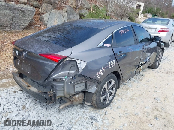 2020 Honda Civic LX with VIN 2HGFC2F6XLH509250, listed as a IAAI auction lot 41904206 with 52,583 mi miles and . Bid and sale history available at DreamBid. Image 4.