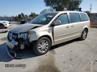 2014 Dodge Grand Caravan SXT z VIN 2C4RDGCG2ER205569, wystawiony jako Copart lot #88557735 z przebiegiem 163 672 mil mil oraz Szkoda całkowita • Salvage title. Historia ofert i sprzedaży dostępna na DreamBid. Obrazek 1.