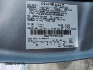 2007 Lincoln Town Car Signature Limited z VIN 1LNHM82W37Y623899, wystawiony jako Copart lot #57691315 z przebiegiem 181 687 mil mil oraz Szkoda całkowita • Salvage title. Historia ofert i sprzedaży dostępna na DreamBid. Obrazek 12.