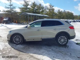 2016 Lincoln MKX Select with VIN 2LMTJ8KRXGBL86620, listed as a IAAI auction lot 41511280 with 90,379 mi miles. Bid and sale history available at carsss.com. Image 15.