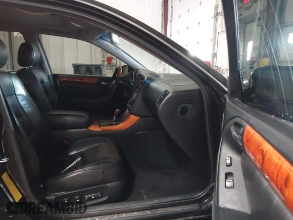 2004 Lexus GS 430 with VIN JT8BL69S440014799, listed as a IAAI auction lot 41394691 with 165,544 mi miles and . Bid and sale history available at DreamBid. Image 5.