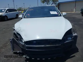 2014 Tesla Model S 60 с VIN 5YJSA1H17EFP40534, выставлен на аукционе IAAI как лот 42346697 с пробегом 203 166 миль миль и . История ставок и продаж доступна на DreamBid. Изображение 13.