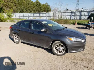2018 Ford Focus SE z VIN 1FADP3FE4JL306237, wystawiony jako Copart lot #56482215 z przebiegiem 102 241 mil mil oraz Czysty tytuł • Clean title. Historia ofert i sprzedaży dostępna na DreamBid. Obrazek 4.