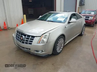 2013 Cadillac CTS Coupe Premium with VIN 1G6DS1E36D0107566, listed as a IAAI auction lot 42079197 with 122,386 mi miles. Bid and sale history available at carsss.com. Image 17.