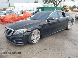 2015 Mercedes-Benz S-Class S 550 with VIN WDDUG8CB0FA162325, listed as a IAAI auction lot 41643485 with 114,766 mi miles. Bid and sale history available at carsss.com. Image 2.