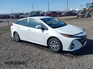 2022 Toyota Prius LE with VIN JTDKAMFP8N3198379, listed as a IAAI auction lot 42094943 with 14,428 mi miles and . Bid and sale history available at DreamBid. Image 1.