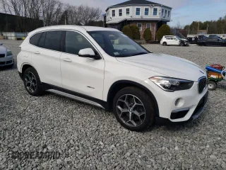 2017 BMW X1 xDrive28i with VIN WBXHT3C32H5F76601, listed as a Copart auction lot 49889965 with 95,655 mi miles and Salvage Title. Bid and sale history available at carsss.com. Image 4.