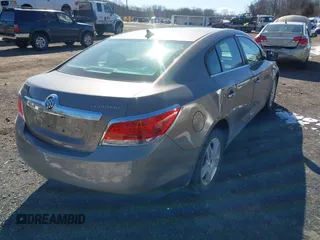 2011 Buick LaCrosse CX z VIN 1G4GA5ED7BF287630, wystawiony jako IAAI lot #41585309 z przebiegiem 132 872 mil mil oraz . Historia ofert i sprzedaży dostępna na DreamBid. Obrazek 4.