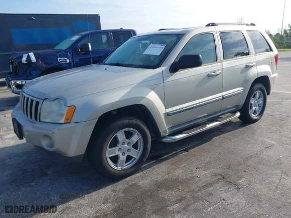 2007 Jeep Grand Cherokee Laredo with VIN 1J8GS48K77C545071, listed as a IAAI auction lot 41999998 with 144,966 mi miles. Bid and sale history available at carsss.com. Image 2.