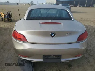 2011 BMW Z4 sDrive30i with VIN WBALM5C5XBE379369, listed as a Copart auction lot 48490475 with 99,425 mi miles and Salvage Title. Bid and sale history available at carsss.com. Image 6.