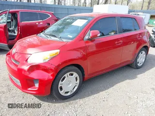 2010 Scion xD with VIN JTKKU4B43A1004049, listed as a IAAI auction lot 42088528 with 98,360 mi miles. Bid and sale history available at carsss.com. Image 2.