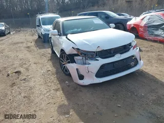 2016 Scion tC with VIN JTKJF5C73GJ014254, listed as a IAAI auction lot 41751320 with 104,247 mi miles. Bid and sale history available at carsss.com. Image 1.