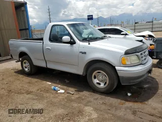 2002 Ford F-150 XL with VIN 1FTRF17242NB04340, listed as a Copart auction lot 58119345 with 218,734 mi miles and Non repairable. Bid and sale history available at DreamBid. Image 4.