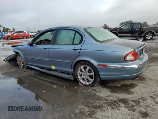2004 Jaguar X-Type z VIN SAJEB52D54XD68737, wystawiony jako Copart lot #85168784 z przebiegiem 150 975 mil mil oraz Szkoda całkowita • Salvage title. Historia ofert i sprzedaży dostępna na DreamBid. Obrazek 2.