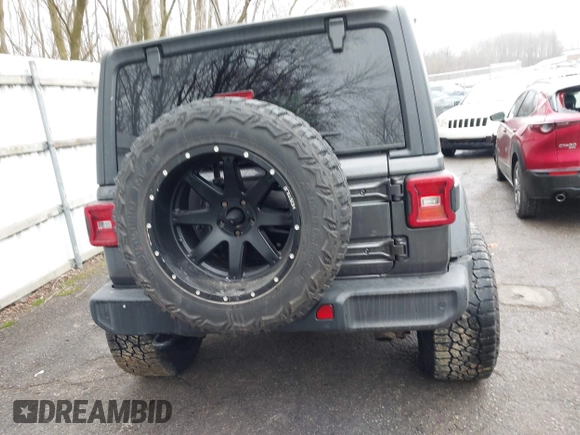 2020 Jeep Wrangler Unlimited Sport z VIN 1C4HJXDN3LW164701, wystawiony jako IAAI lot #41200437 z przebiegiem 102 272 mil mil oraz . Historia ofert i sprzedaży dostępna na DreamBid. Obrazek 16.