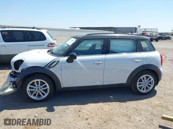 2016 MINI Countryman S with VIN WMWZC3C54GWT08011, listed as a IAAI auction lot 42274242 with 99,183 mi miles and . Bid and sale history available at DreamBid. Image 14.