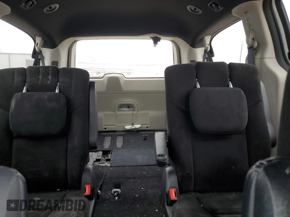 2015 Dodge Grand Caravan SE with VIN 2C4RDGBG3FR636473, listed as a Copart auction lot 53513275 with 128,994 mi miles and Salvage Title. Bid and sale history available at DreamBid. Image 10.