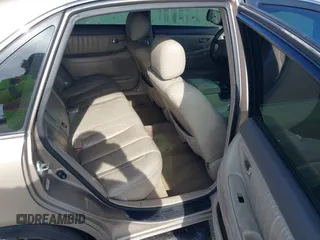 2001 Toyota Avalon XL w/Bucket Seats with VIN 4T1BF28BX1U117793, listed as a IAAI auction lot 42165172 with 247,435 mi miles. Bid and sale history available at carsss.com. Image 8.