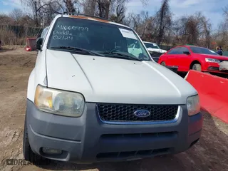 2003 Ford Escape XLT Popular 2 with VIN 1FMCU93163KB78008, listed as a IAAI auction lot 41660779 with 153,898 mi miles. Bid and sale history available at carsss.com. Image 6.
